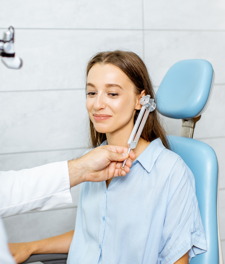 woman undergoing an audio and balance test.