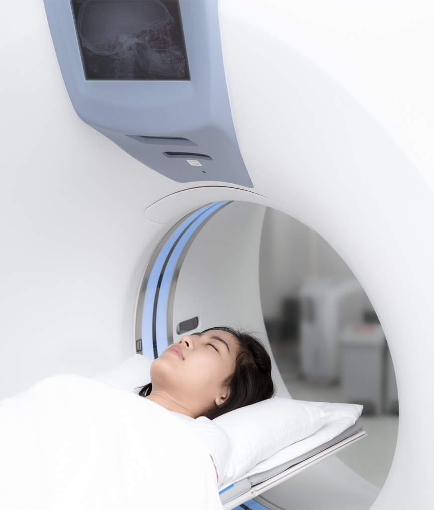 woman receiving a CT scan