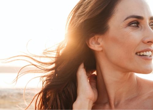 Brunette woman at the beach